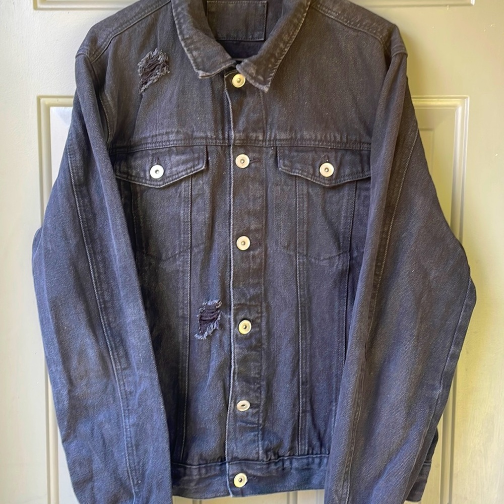 Distressed jean jacket